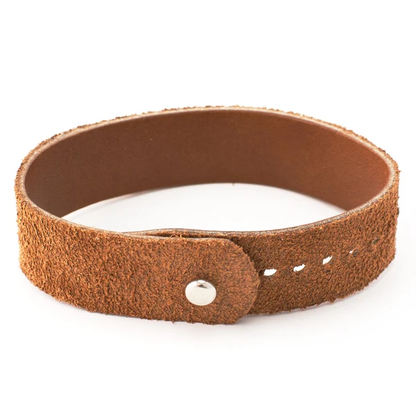 Empty brown leather cuff bracelet with snap closure, on white background